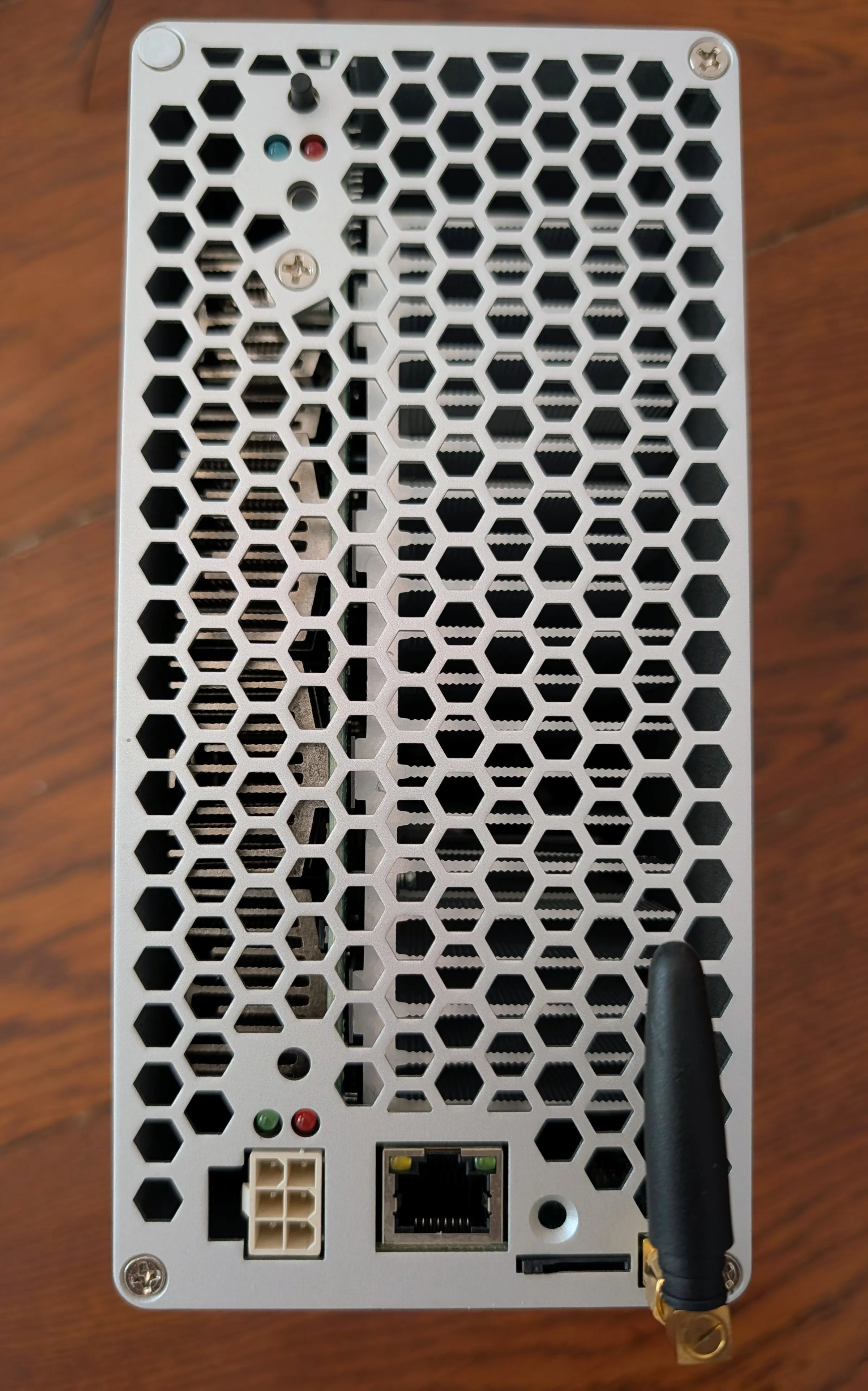 Rear of the SC Box: a single 6-pin PCIe socket, Ethernet port, reset pinhole, SD slot, and the antenna